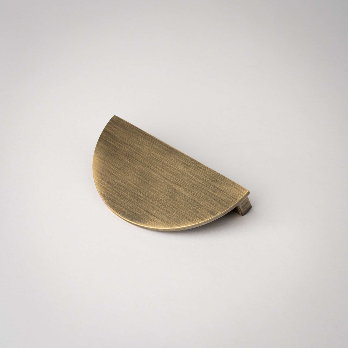 Demi Lune, Solid Brass Half Moon Cabinet PullsOur handmade Demi Lune cabinet handle is designed to be mounted in pairs to form a full circle or mounted horizontally as a half moon. In either orientation, it exudpullDemi Lune, Solid Brass Half Moon Pulls