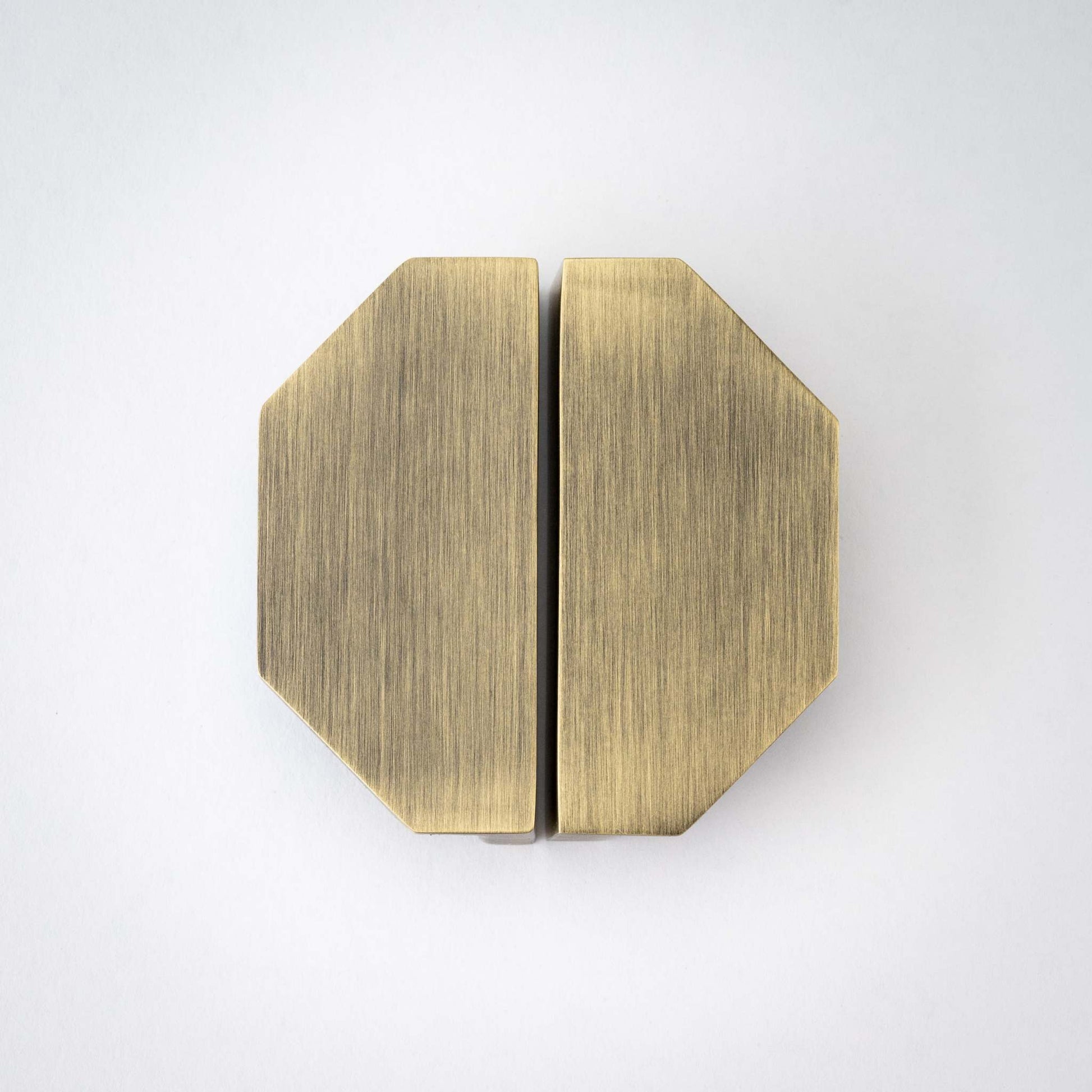 Alto, Solid Brass Half Hex PullsAlto, our handmade Half Hex cabinet handle, is designed to be mounted in pairs to form a full hexagon or mounted horizontally as a partial hexagon. In either orientapullAlto, Solid Brass Half Hex Pulls