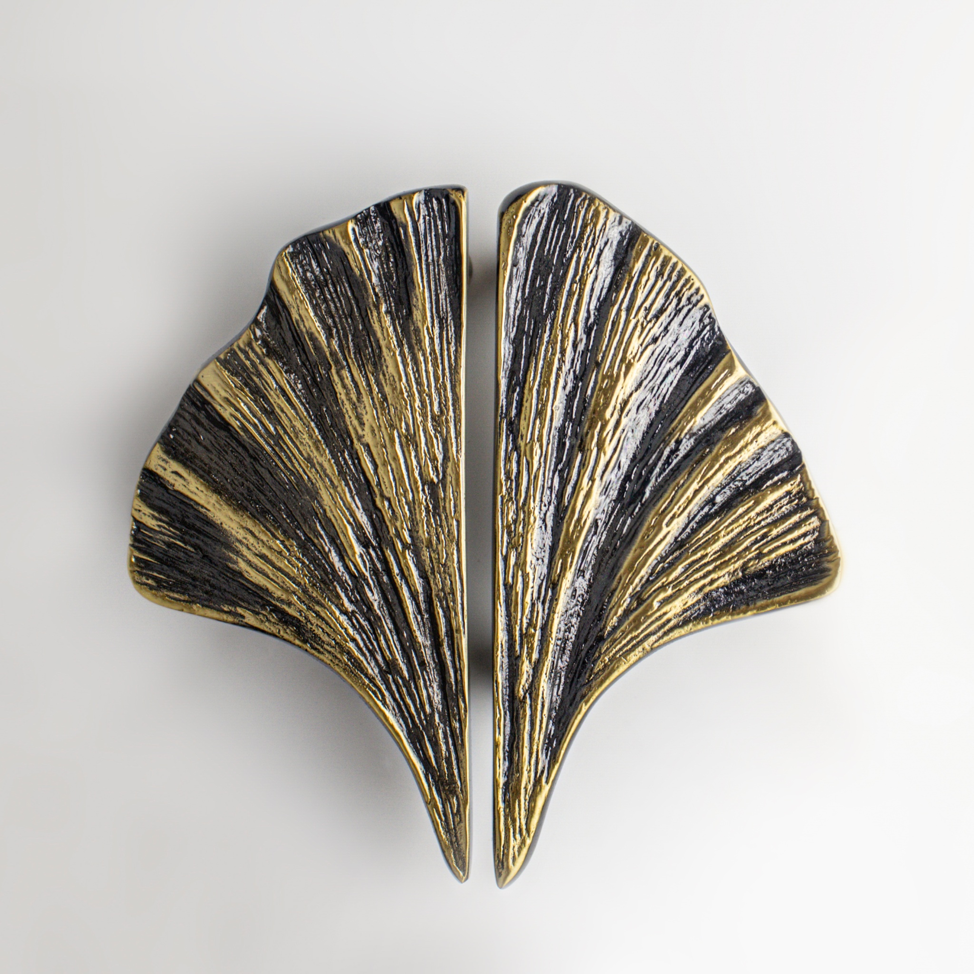 Gingko, Solid Brass Door Pulls Inspired by the timeliness of nature, Gingko is wispy, yet substantial. Gingko is so versatile, it can be installed side-by-side as a pair on cabinets, horizontally Door HandlesGingko, Solid Brass Large Pulls