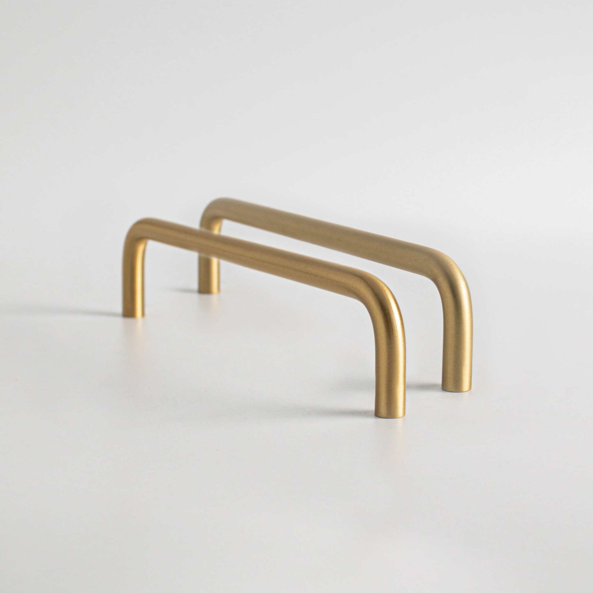 Arch, Solid Brass Wire Cabinet Pulls


Effortlessly beautiful, Arch pull brings a minimalist elegance to your kitchen or bath. Its solid brass construction gives this pieces a solid feel in the hand, wpullArch, Solid Brass Wire Cabinet Pulls