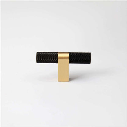 Bold, Black & Gold Knurled Cabinet Pulls Go BOLD in your home!Our Bold, Black and "gold" cabinet pull brings a modern feel to your cabinetry. Its two-toned style is visually fresh, while its knurled matpullBold, Black & Gold Knurled Solid Brass Cabinet Pulls