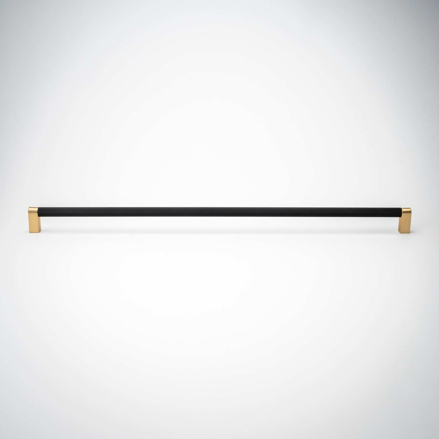 Bold, Black & Gold Knurled Cabinet PullsGo BOLD in your home!Our Bold, Black and "gold" cabinet pull brings a modern feel to your cabinetry. Its two-toned style is visually fresh, while its knurled matpullBold, Black & Gold Knurled Solid Brass Cabinet Pulls