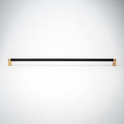 Bold, Black & Gold Knurled Cabinet PullsGo BOLD in your home!Our Bold, Black and "gold" cabinet pull brings a modern feel to your cabinetry. Its two-toned style is visually fresh, while its knurled matpullBold, Black & Gold Knurled Solid Brass Cabinet Pulls