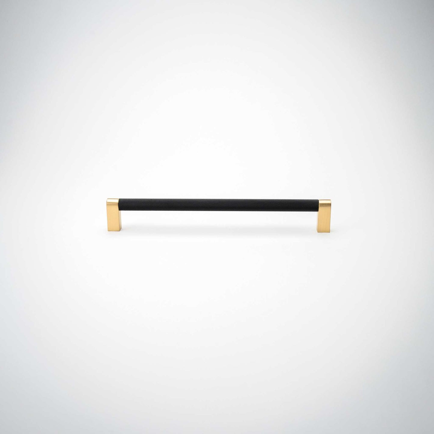 Bold, Black & Gold Knurled Cabinet PullsGo BOLD in your home!Our Bold, Black and "gold" cabinet pull brings a modern feel to your cabinetry. Its two-toned style is visually fresh, while its knurled matpullBold, Black & Gold Knurled Solid Brass Cabinet Pulls