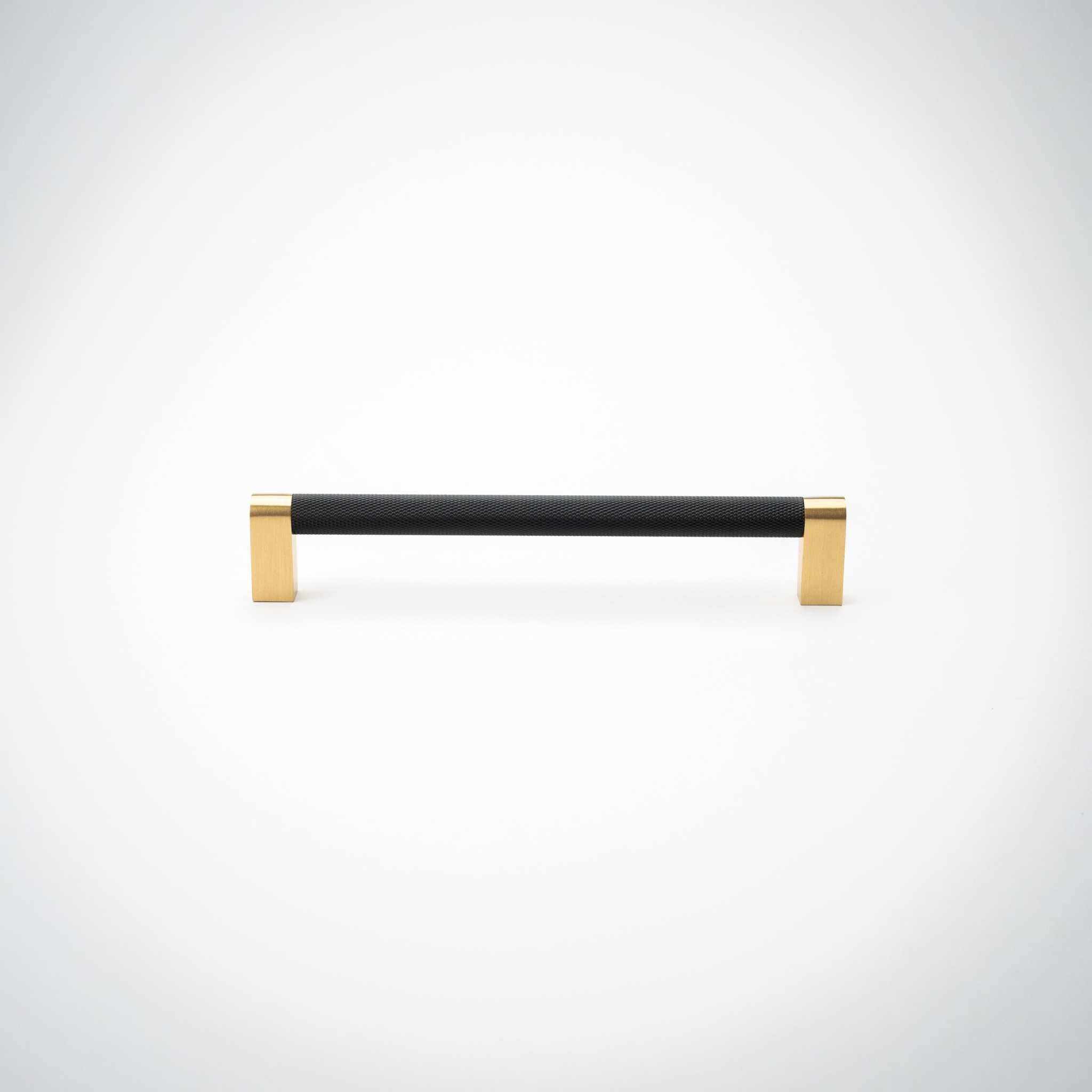 Bold, Black & Gold Knurled Cabinet Pulls Go BOLD in your home!Our Bold, Black and "gold" cabinet pull brings a modern feel to your cabinetry. Its two-toned style is visually fresh, while its knurled matpullBold, Black & Gold Knurled Solid Brass Cabinet Pulls