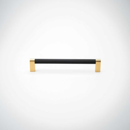 Bold, Black & Gold Knurled Cabinet Pulls Go BOLD in your home!Our Bold, Black and "gold" cabinet pull brings a modern feel to your cabinetry. Its two-toned style is visually fresh, while its knurled matpullBold, Black & Gold Knurled Solid Brass Cabinet Pulls