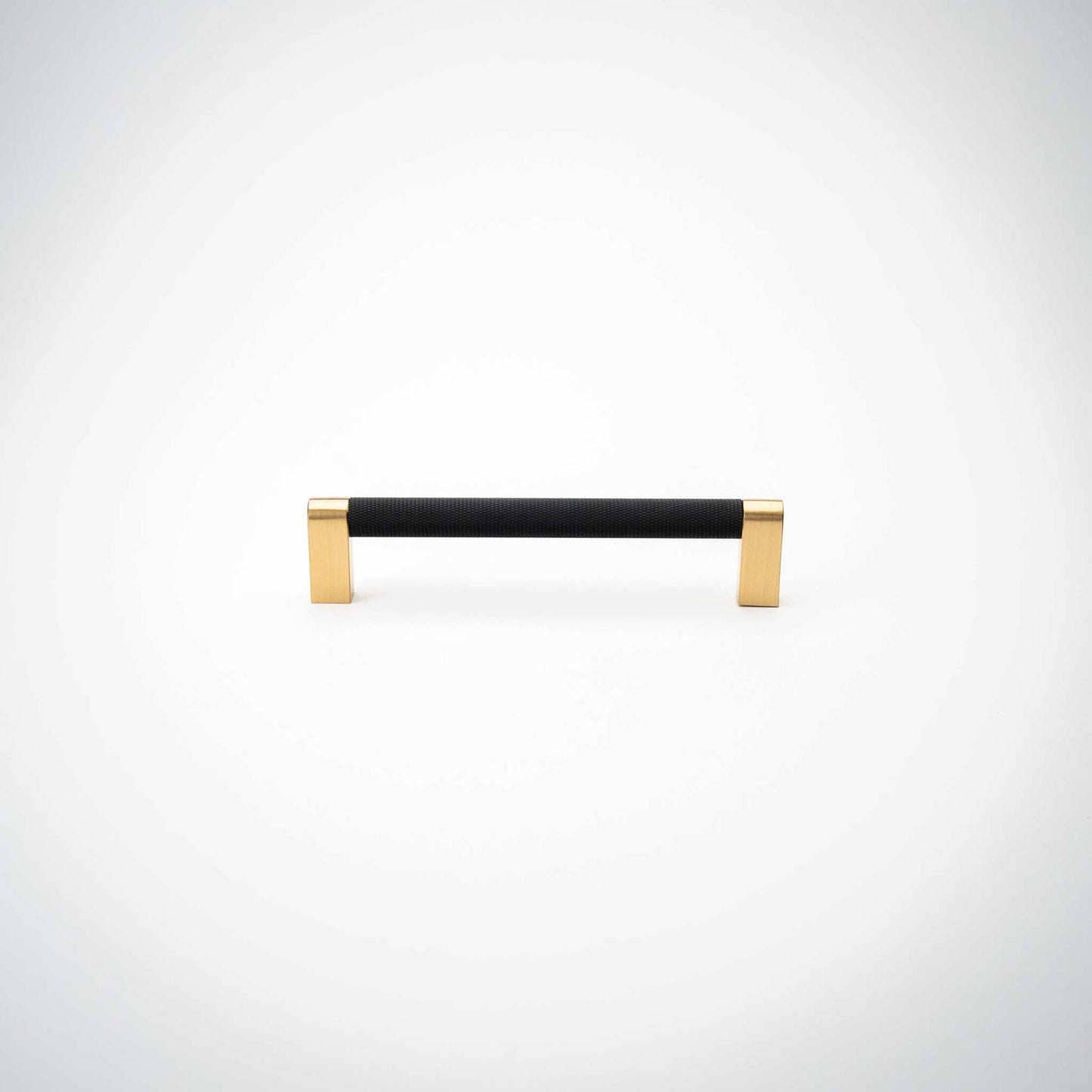 Bold, Black & Gold Knurled Cabinet Pulls Go BOLD in your home!Our Bold, Black and "gold" cabinet pull brings a modern feel to your cabinetry. Its two-toned style is visually fresh, while its knurled matpullBold, Black & Gold Knurled Solid Brass Cabinet Pulls