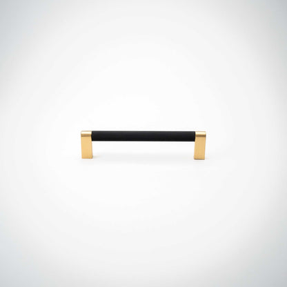 Bold, Black & Gold Knurled Cabinet Pulls Go BOLD in your home!Our Bold, Black and "gold" cabinet pull brings a modern feel to your cabinetry. Its two-toned style is visually fresh, while its knurled matpullBold, Black & Gold Knurled Solid Brass Cabinet Pulls