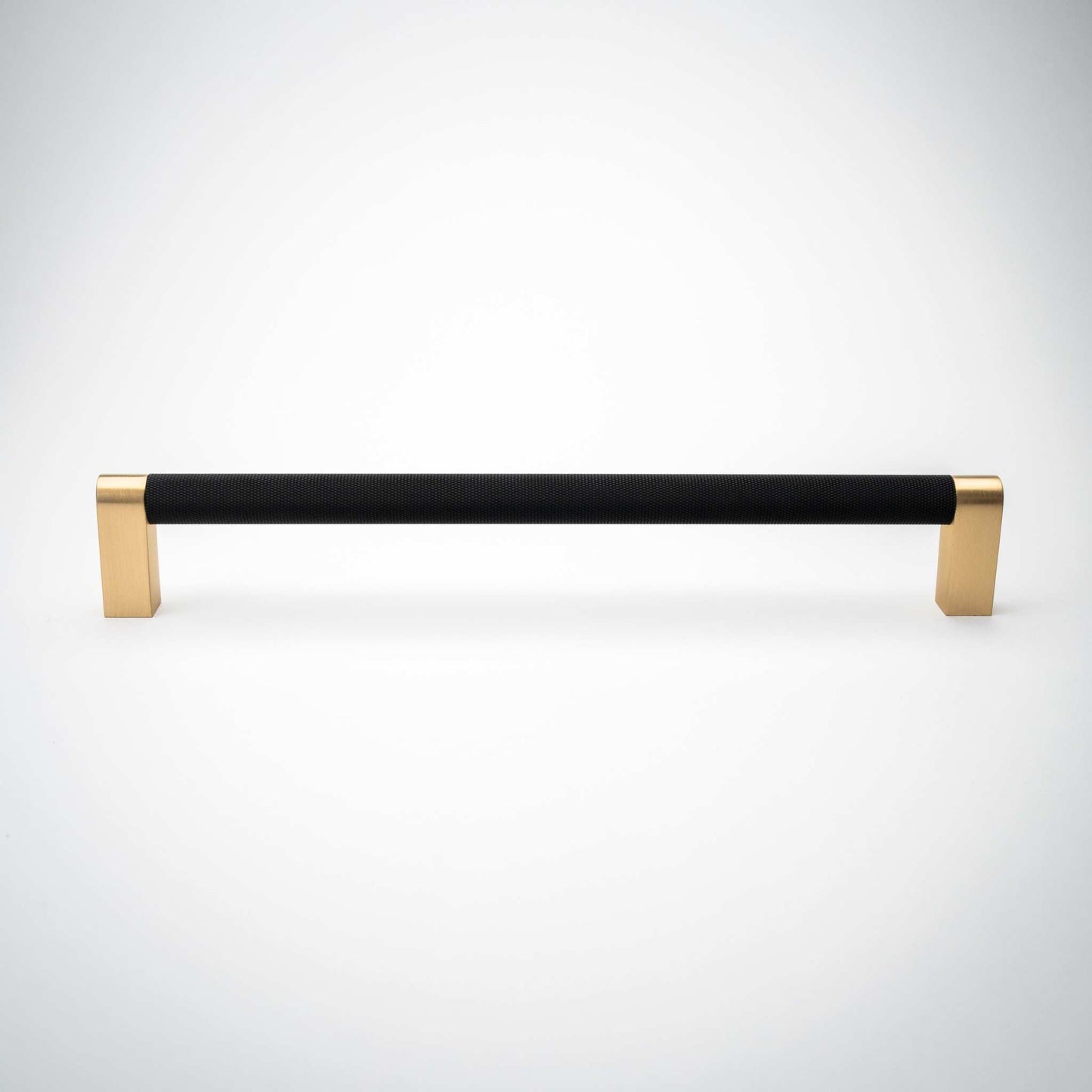 Bold, Black & Gold Knurled Cabinet Pulls Go BOLD in your home!Our Bold, Black and "gold" cabinet pull brings a modern feel to your cabinetry. Its two-toned style is visually fresh, while its knurled matpullBold, Black & Gold Knurled Solid Brass Cabinet Pulls