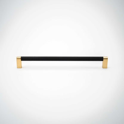 Bold, Black & Gold Knurled Cabinet PullsGo BOLD in your home!Our Bold, Black and "gold" cabinet pull brings a modern feel to your cabinetry. Its two-toned style is visually fresh, while its knurled matpullBold, Black & Gold Knurled Solid Brass Cabinet Pulls