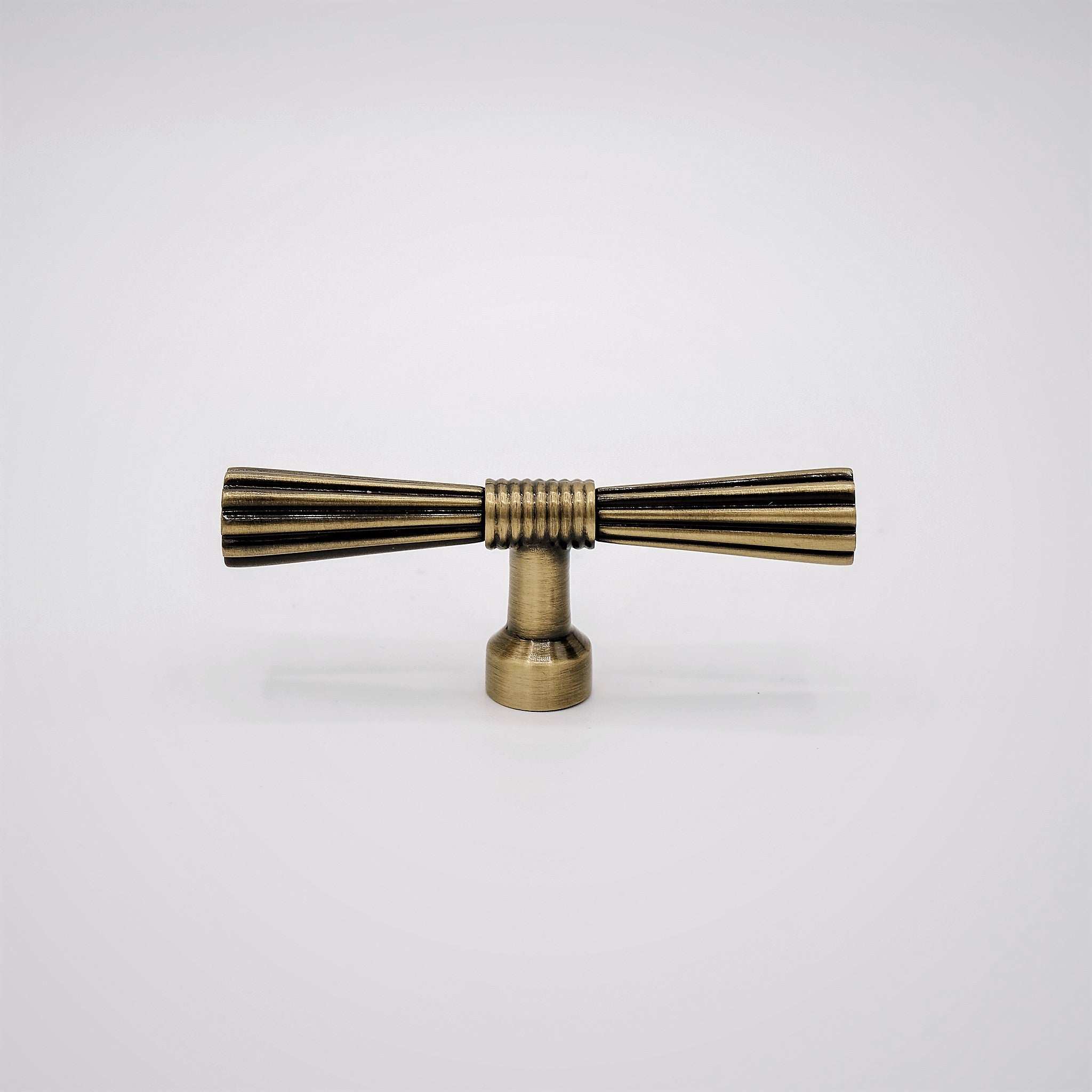 Beau, Antique Brass Cabinet Knob Simple elegance in a minimalist yet modern design, Beau elevates a space with both visual and tactile textures that draws attention without distracting from the sKnobBeau, Antique Brass Knob