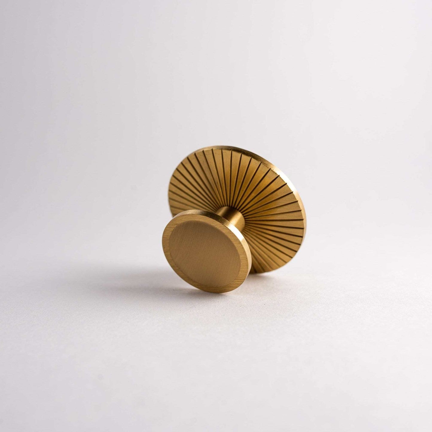 Sunburst, Solid Brass Cabinet Knobs Our Sunburst Knob is a distinctive take on the transitional cabinet knob. Perfectly designed to adorn cabinet doors and drawers.This product is not available KnobSunburst, Solid Brass Cabinet Knobs