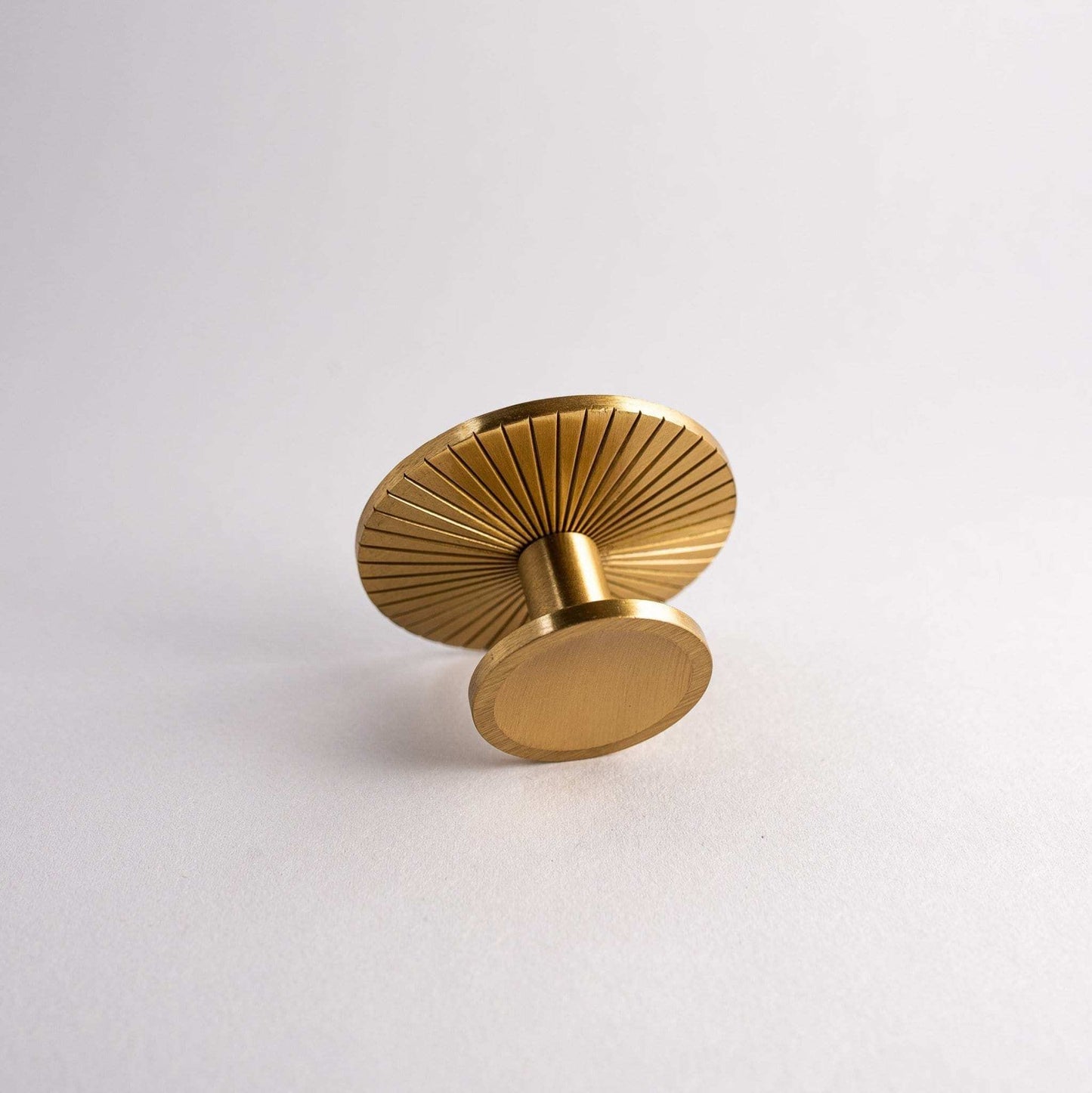 Sunburst, Solid Brass Cabinet Knobs Our Sunburst Knob is a distinctive take on the transitional cabinet knob. Perfectly designed to adorn cabinet doors and drawers.This product is not available KnobSunburst, Solid Brass Cabinet Knobs